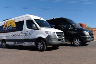 Shuttle vehicle representing scheduled transportation by St. George Shuttle